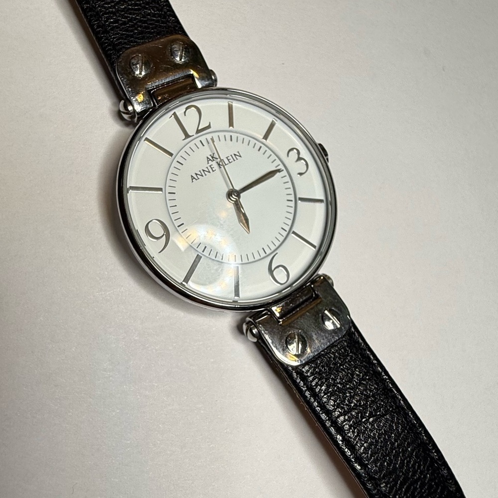 Anne Klein Women’s Watch Black Leather Strap Silver Tone Model Y1211